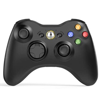 Black gaming controller with colored buttons.