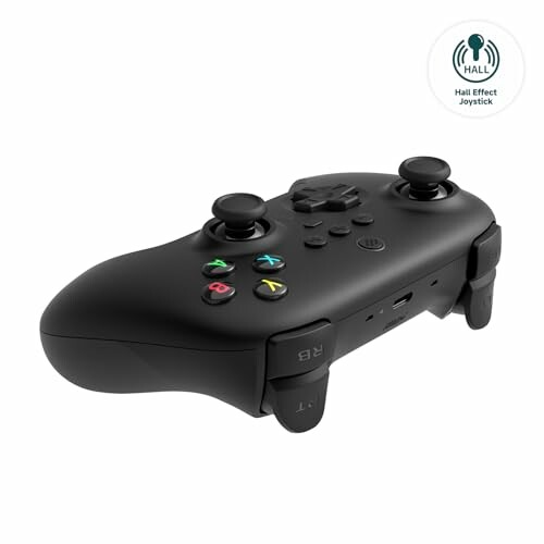Black wireless gaming controller with buttons and joysticks