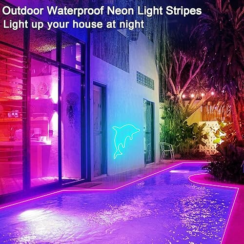 Outdoor neon light stripes illuminating a poolside area with a dolphin design.