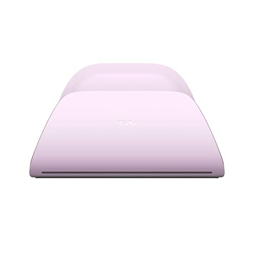 Pink instant photo printer on white background